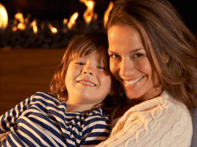 family by gas fireplace